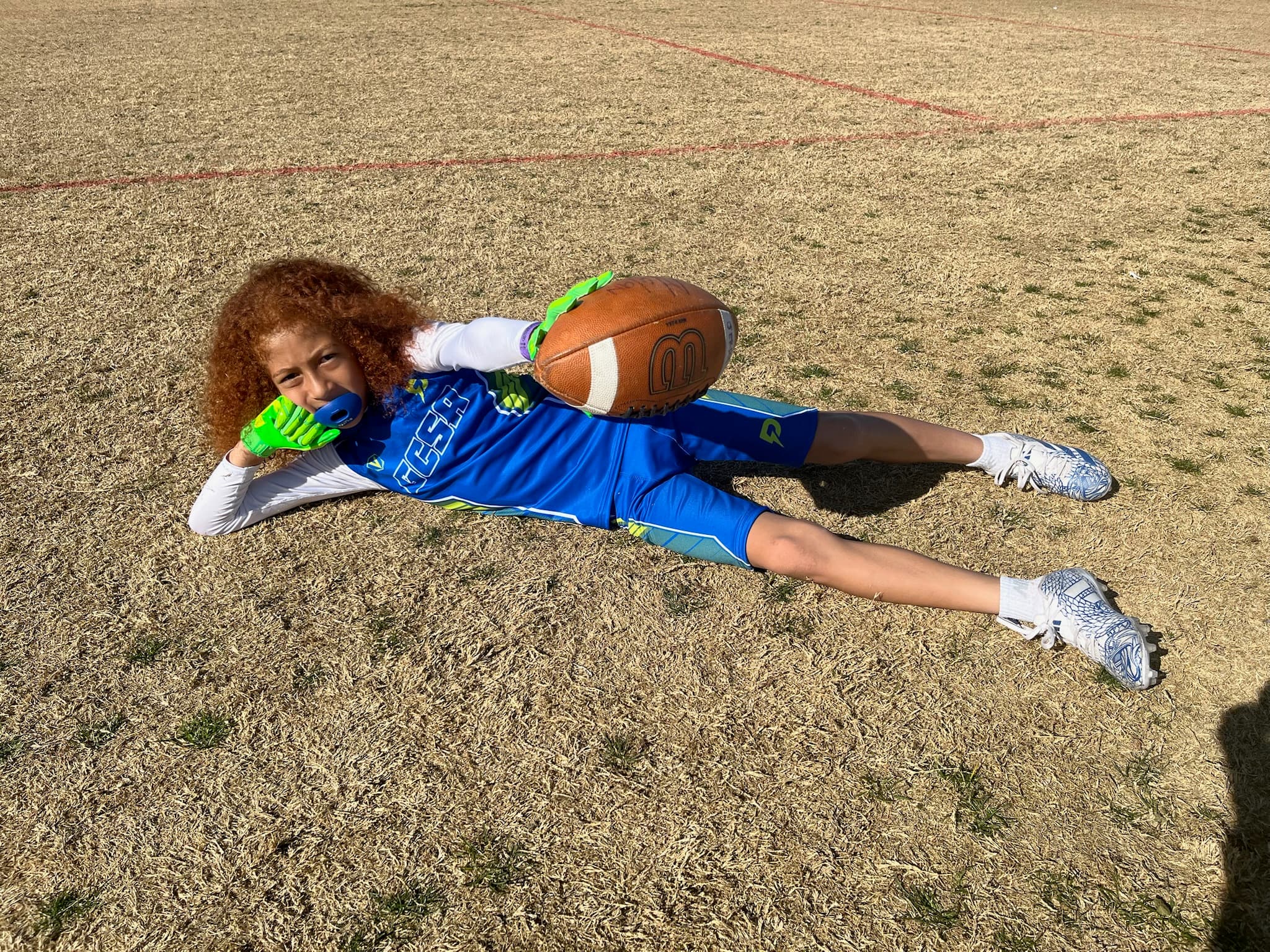 Three athletes with ball