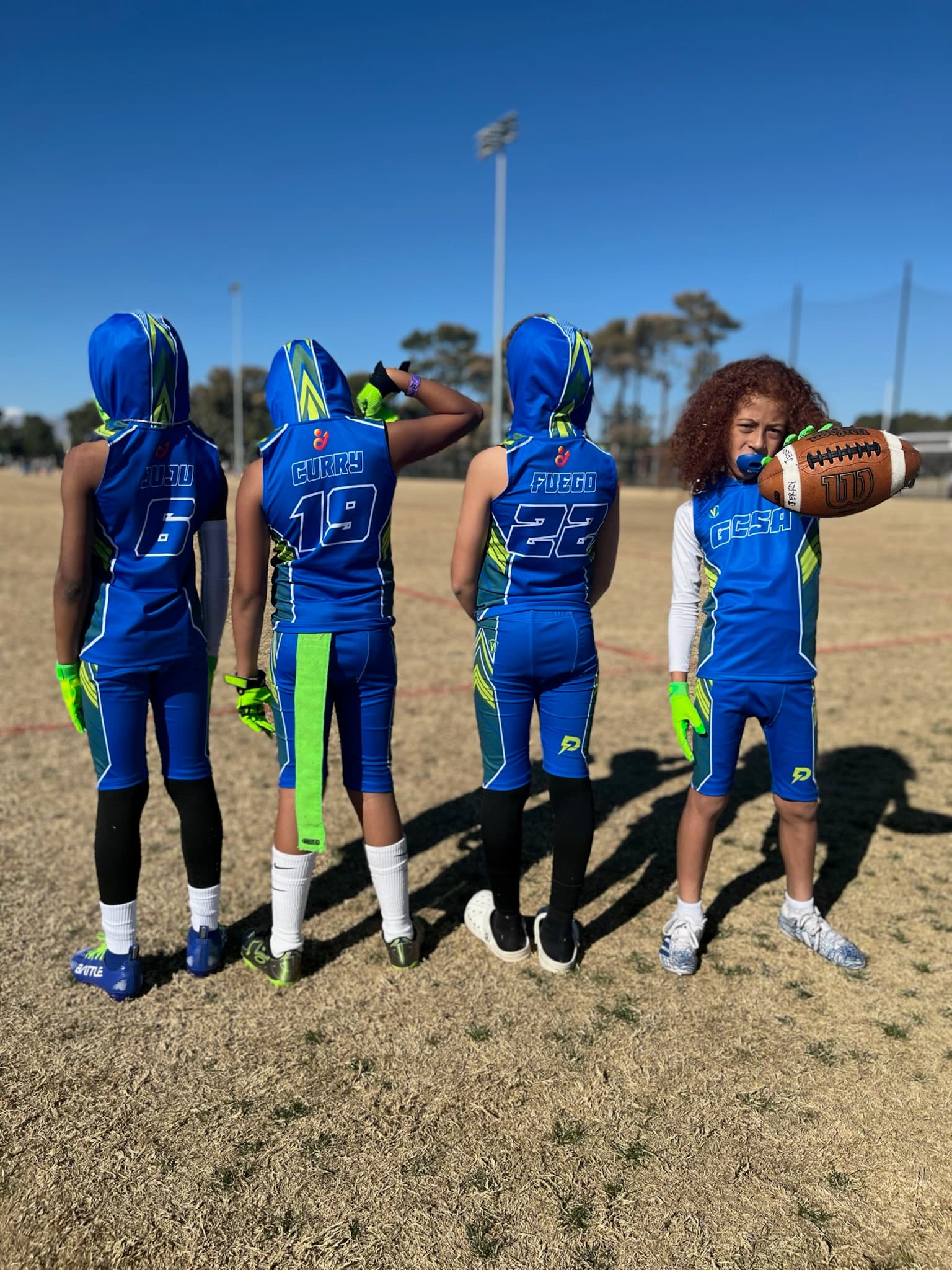 Players backs turned